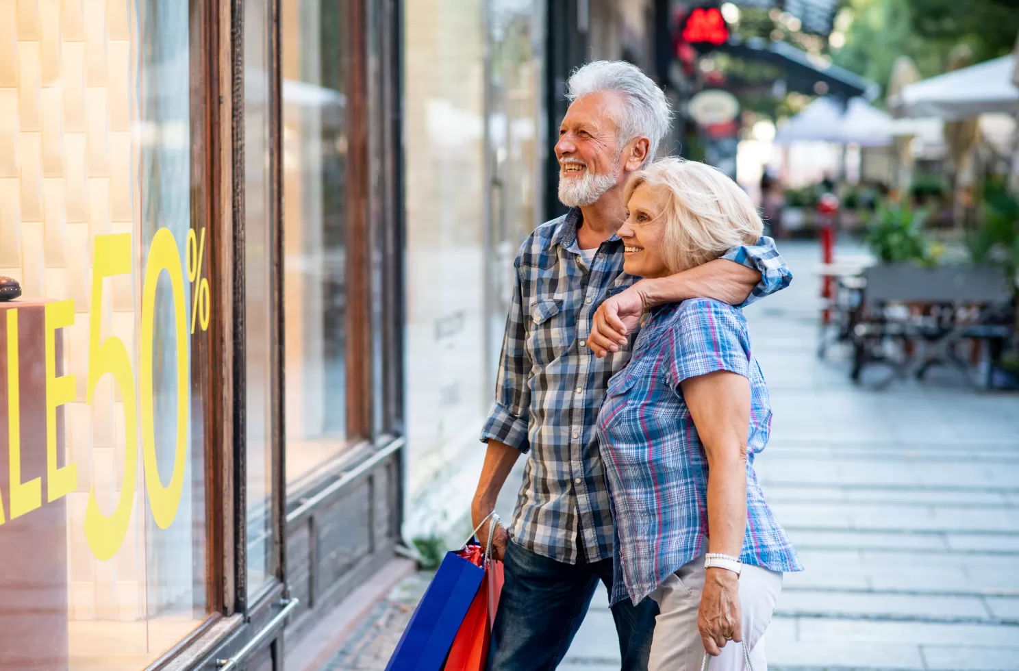 Couple looking at window